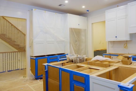 Kitchen remodeling in Homewood, IL, mid progress as the cabinets and kitchen island are being installed